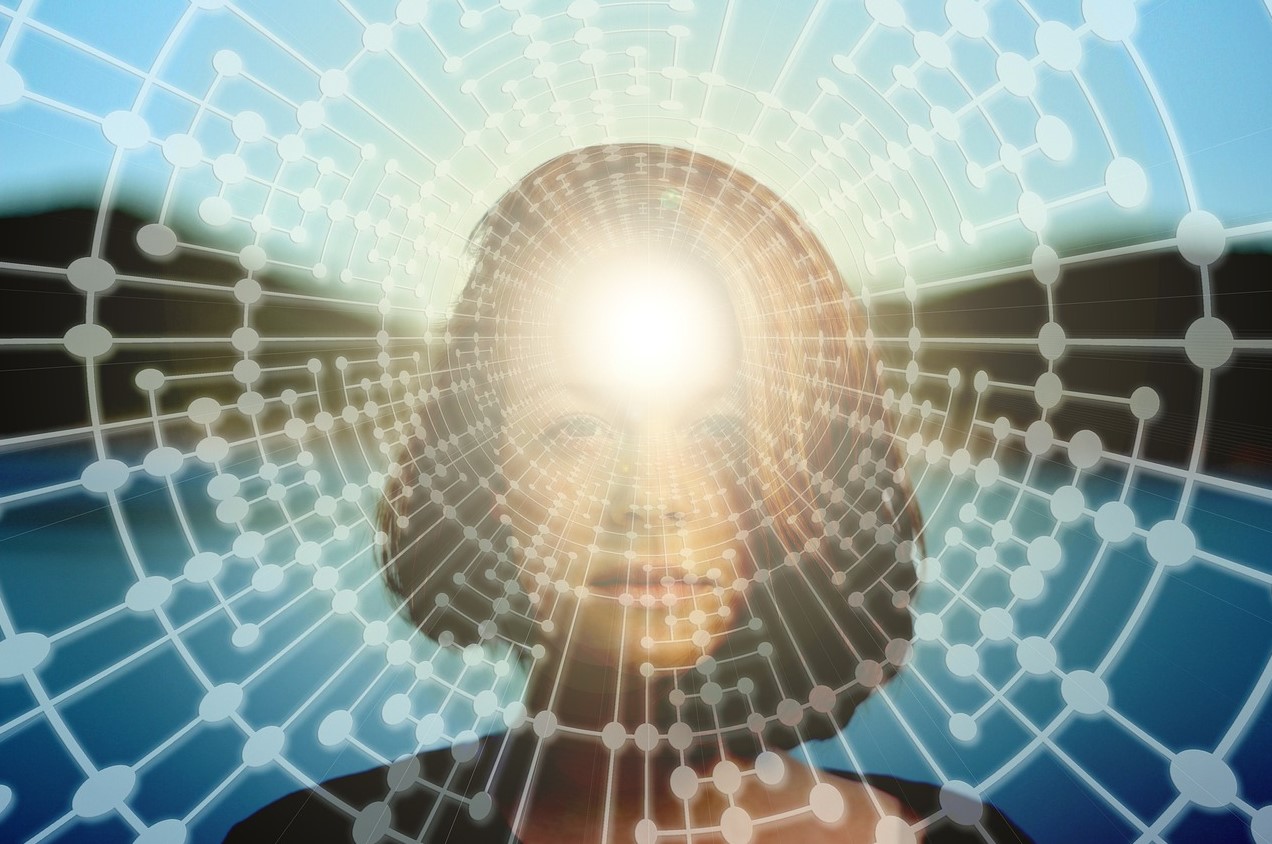 A women with light exuding from her forehead