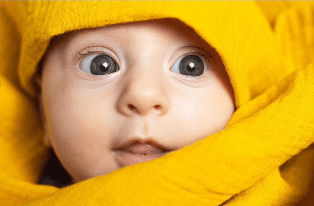 Cute baby with big brown eyes