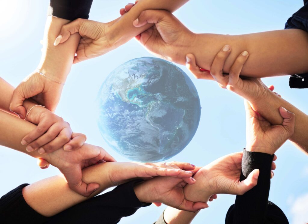 Inspiration - a group of people holding hands in a circle